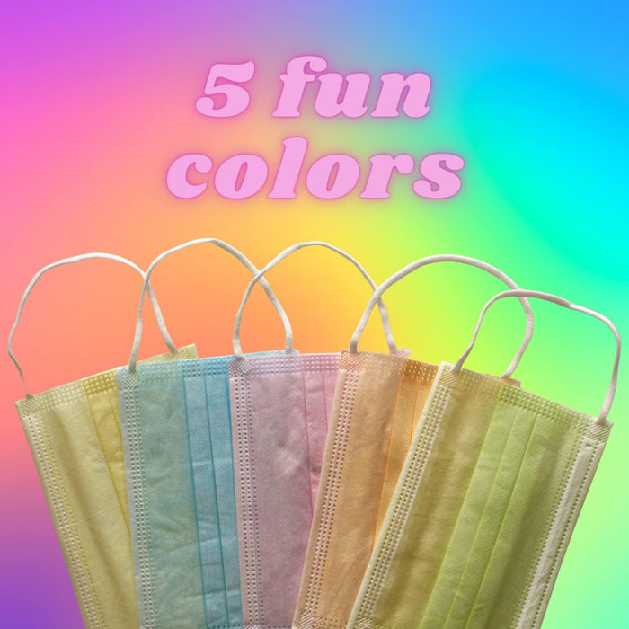 Five MagiCare kids disposable face masks in pink, blue, green, orange, and yellow